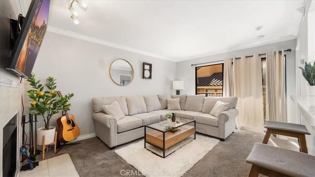 living area with a fireplace with flush hearth, crown molding, baseboards, and carpet flooring