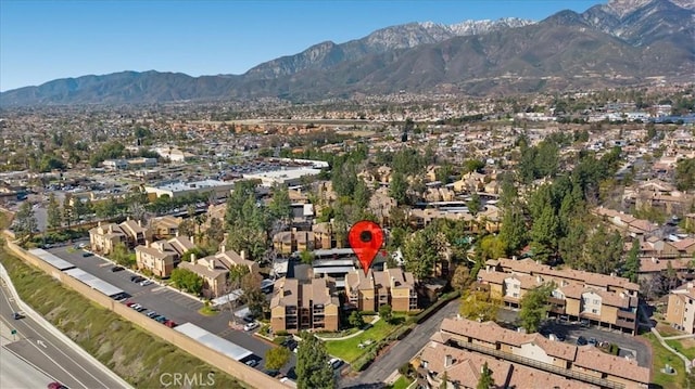 bird's eye view with a residential view and a mountain view