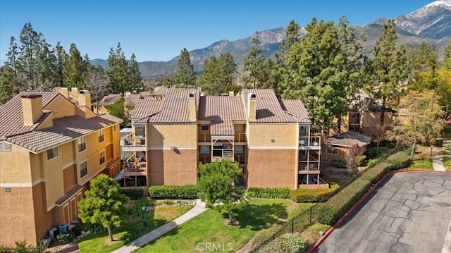 birds eye view of property featuring a residential view and a mountain view