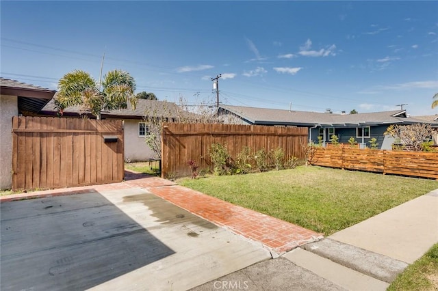 view of yard featuring a patio area and fence