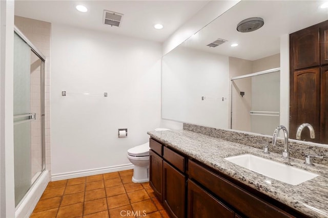 435 S La Fayette Park Pl Unit 311, Los Angeles, CA 90057 - full bath with a stall shower, vanity, toilet, tile patterned floors, and baseboards