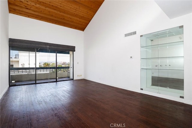 435 S La Fayette Park Pl Unit 311, Los Angeles, CA 90057 - spare room featuring high vaulted ceiling, baseboards, and wood finished floors