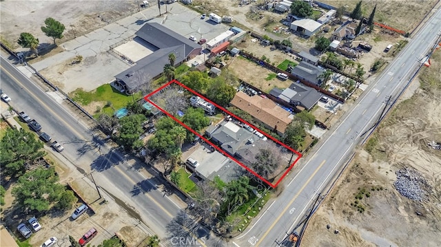 10917 Locust Ave, Bloomington, CA 92316 - drone / aerial view with a residential view