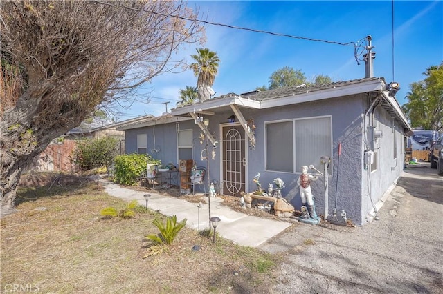10917 Locust Ave, Bloomington, CA 92316 - ranch-style home featuring fence and stucco siding
