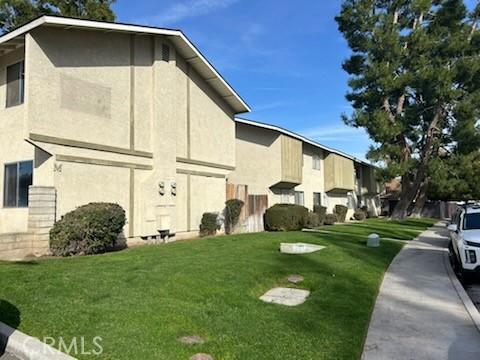 exterior space with a lawn