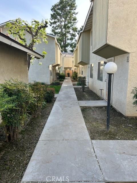 view of side of home featuring stucco siding