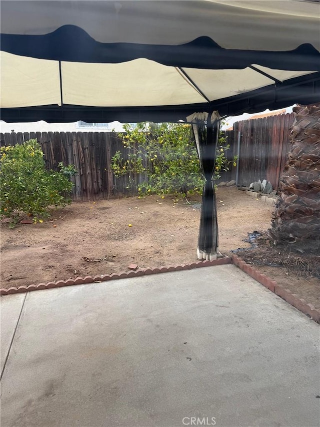 view of patio / terrace with fence