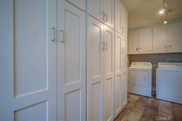 712 Via Zapata, Riverside, CA 92507 - laundry area with cabinet space, independent washer and dryer, and stone finish flooring