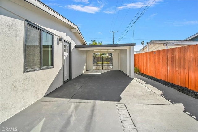 view of patio / terrace featuring fence