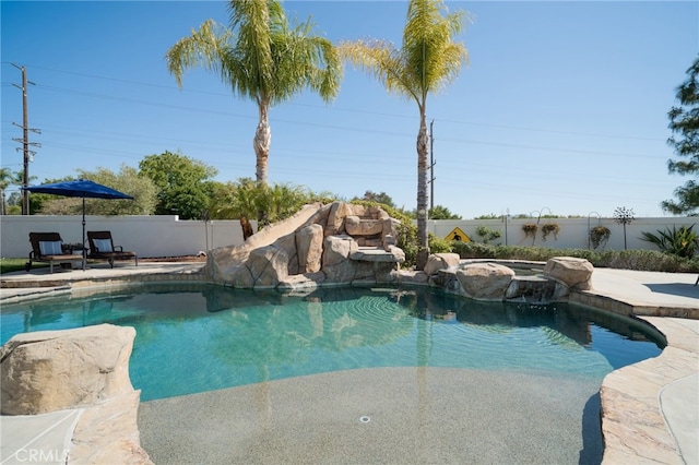 view of pool with a fenced backyard and a fenced in pool