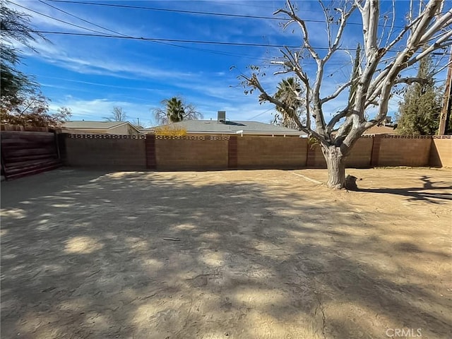 view of yard featuring fence