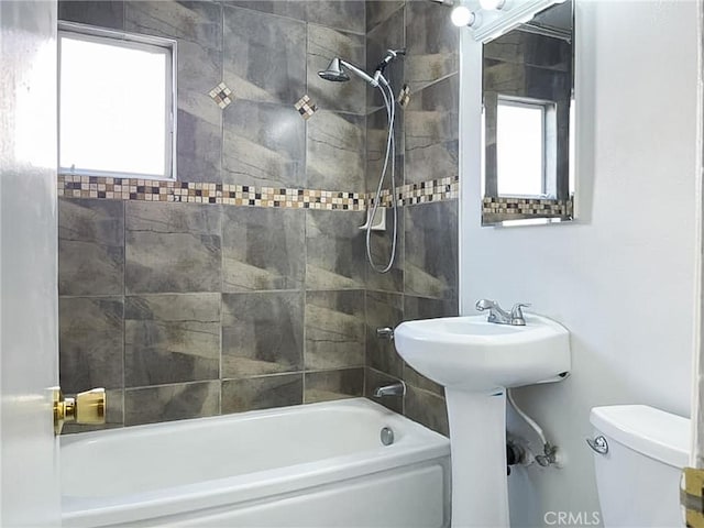 full bath featuring bathtub / shower combination and toilet