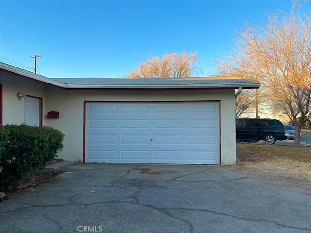 garage with driveway