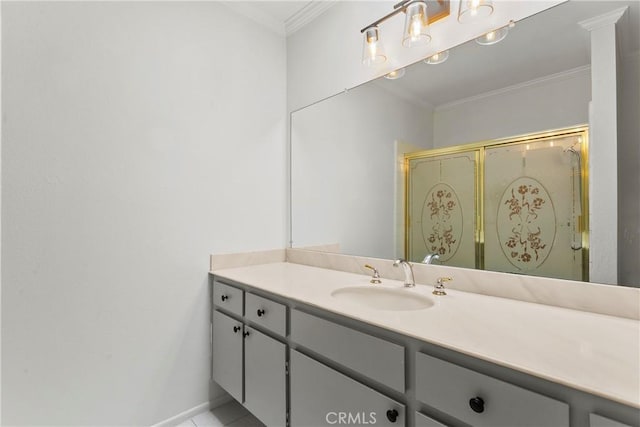 bathroom with baseboards, a shower stall, vanity, and crown molding