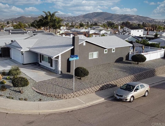 bird's eye view featuring a residential view and a mountain view