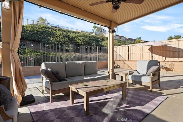 view of patio with a ceiling fan, a fenced backyard, and an outdoor hangout area