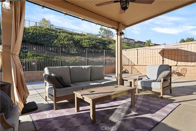 34306 Deergrass Way, Lake Elsinore, CA 92532 - view of patio / terrace with a fenced backyard, ceiling fan, and an outdoor living space
