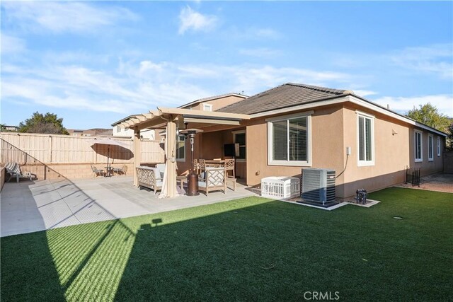 34306 Deergrass Way, Lake Elsinore, CA 92532 - rear view of house with fence, a pergola, a patio, central AC unit, and a yard