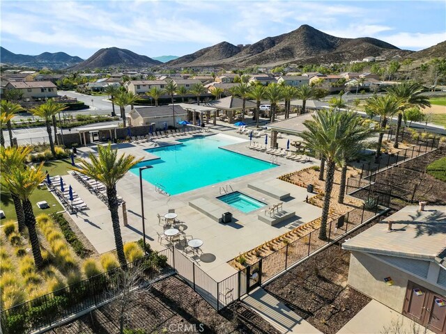 34306 Deergrass Way, Lake Elsinore, CA 92532 - community pool featuring fence, a residential view, a mountain view, and a patio area