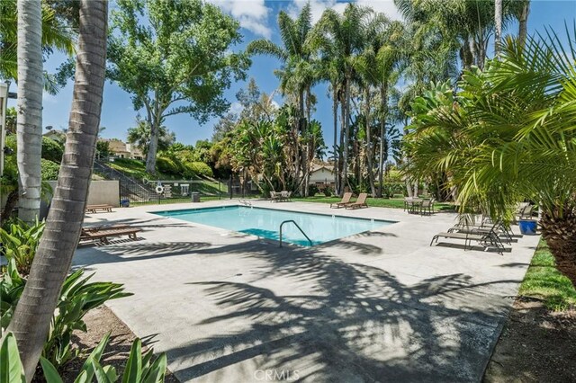 7969 Calle Madrid, Carlsbad, CA 92009 - community pool featuring a patio