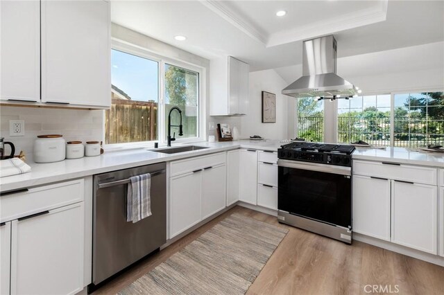 7969 Calle Madrid, Carlsbad, CA 92009 - kitchen featuring dishwasher, range with gas stovetop, ventilation hood, a sink, and healthy amount of natural light