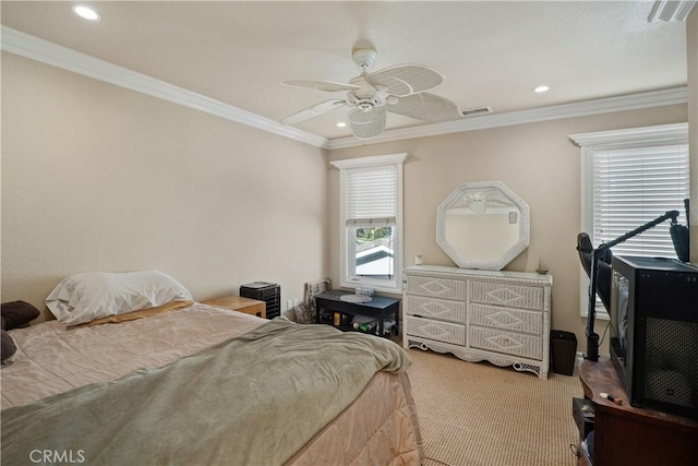 carpeted bedroom with recessed lighting, visible vents, crown molding, and ceiling fan