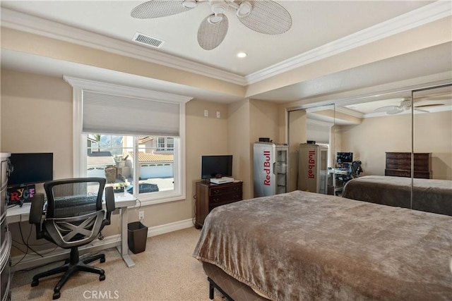 bedroom with ornamental molding, light colored carpet, visible vents, and baseboards