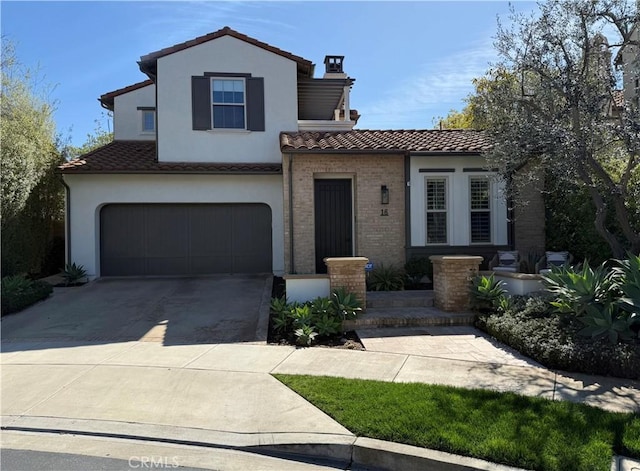 view of front of house with a garage, brick siding, a tile roof, concrete driveway, and stucco siding