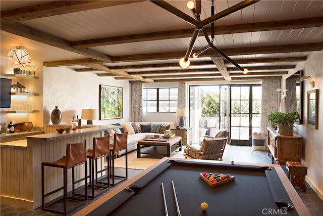 game room featuring pool table, wooden ceiling, plenty of natural light, and beamed ceiling