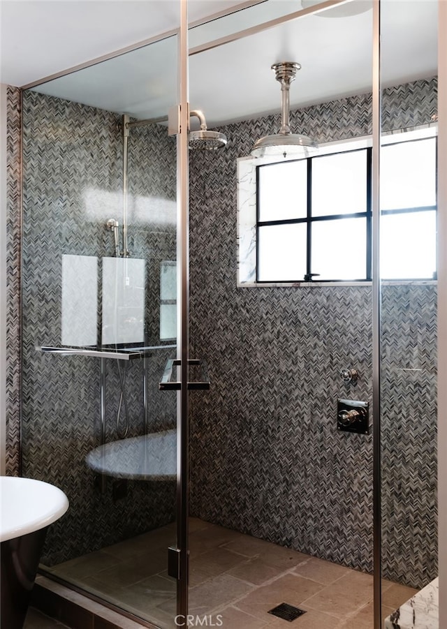 bathroom featuring a shower stall