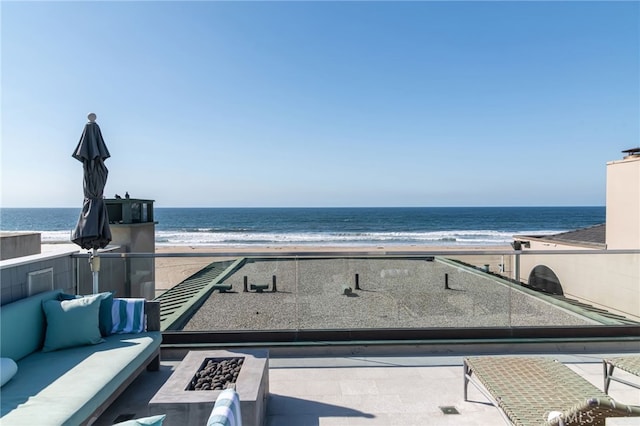 view of water feature with a beach view