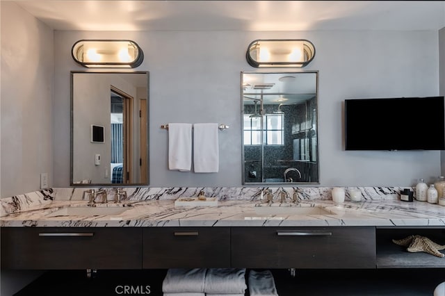 bathroom with double vanity and a sink