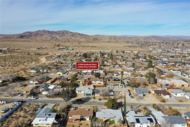 birds eye view of property featuring a residential view and a mountain view