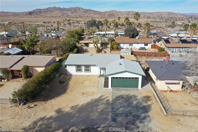 bird's eye view with a residential view and a mountain view