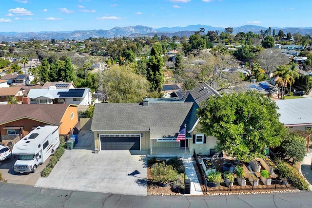 birds eye view of property featuring a residential view and a mountain view