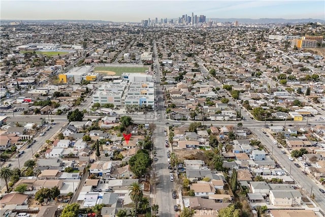 birds eye view of property with a city view