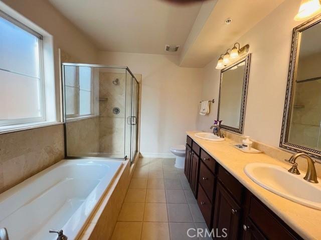 14242 Burbank Blvd Unit 103, Sherman Oaks, CA 91401 - bathroom with a garden tub, a stall shower, double vanity, and toilet