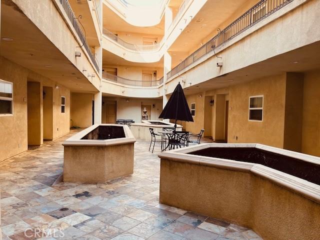 14242 Burbank Blvd Unit 103, Sherman Oaks, CA 91401 - view of patio with outdoor dining area