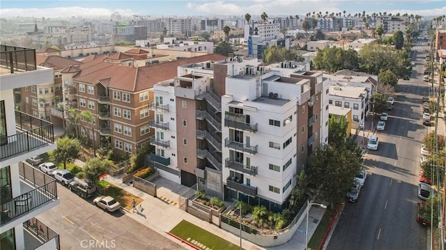 birds eye view of property featuring a view of city