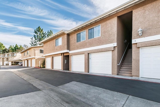 exterior space featuring stucco siding