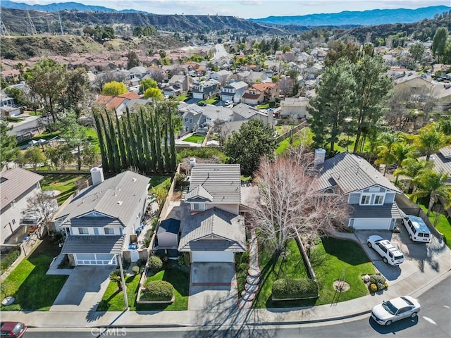 aerial view featuring a residential view and a mountain view