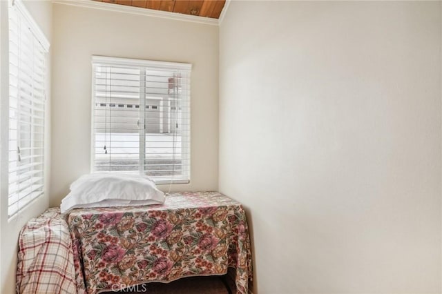 bedroom featuring crown molding