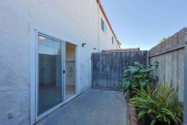 view of patio / terrace with fence