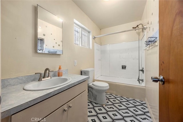 full bathroom with  shower combination, vanity, and toilet