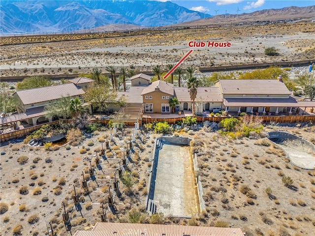 aerial view with a mountain view and view of desert