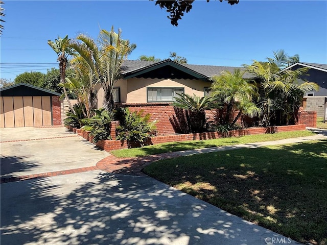 268 E 18th St, Costa Mesa, CA 92627 - view of front of property featuring stucco siding and a front lawn