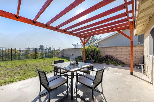 view of patio / terrace featuring a fenced backyard, outdoor dining area, and a pergola