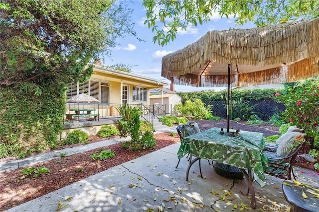 view of patio with fence