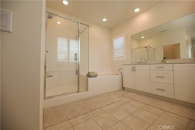 full bath featuring visible vents, vanity, a bath, tile patterned floors, and a stall shower