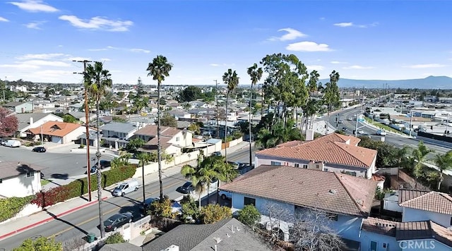 drone / aerial view with a residential view and a mountain view